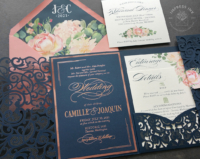 Navy Coral Floral Invitation with rose gold foil imprint on dark blue invitation card. Bright coral flowers and envelopes.
