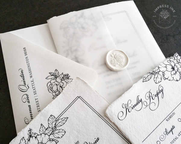 Black Floral Sketch Invitation with line art flowers, hand-torn edges and translucent vellum wraps