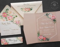 Coral Floral Acrylic Invitation with geometric hexagon border and pink folder and envelopes