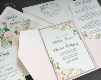 Pink Floral Pocket Invitation with pink and cream watercolor flowers mounted with a gold glitter backing layer inside a light pink pocket folder