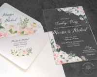 Blush Floral Acrylic Invitation with light purple, pink and cream flowers on a clear acrylic card.
