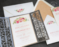 Bright Coral Floral Invitation with pink and peach watercolor flowers in a gray laser cut gate folder