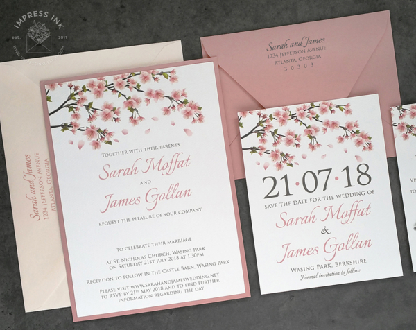 Blush Cherry Blossom Invitation with spring cherry blossom tree in blush pink cascading across the top of the card.