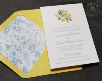 Watercolor Lemons Letterpress Invitation with light blue text in letterpress imprint, yellow envelopes