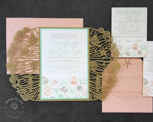 Seashell Beach Gatefold Invitation mounted inside a laser cut seashell folder