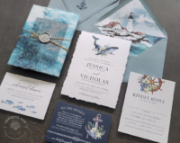 Watercolor Whale Nautical Invitation with hand-torn edges, lighthouse envelope liners, anchor and ship wheel details