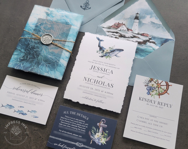 Watercolor Whale Nautical Invitation with hand-torn edges, lighthouse envelope liners, anchor and ship wheel details