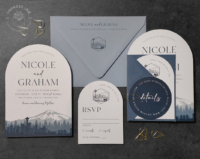 Seattle Skyline Arch Invitation with city silhouette in shades of navy blue, ferry boat reply cards, and dusty blue envelopes