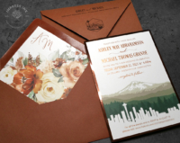 Autumn Seattle Skyline Invitation with mountain landscape and terracotta envelopes with fall color florals