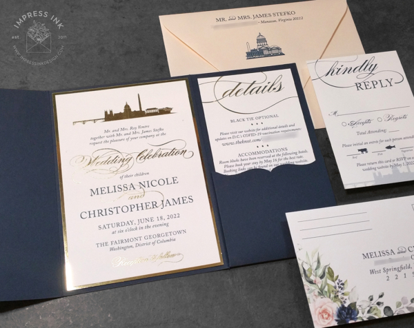Washington City Pocket Invitation in gold foil imprint in navy folder, blush floral accents and envelopes