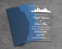 Charlotte Skyline Acrylic Invitation with white city silhouette on clear acrylic cards, navy blue envelopes