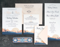 Arizona Desert Landscape Invitation in shades of pink, coral, and slate blue.