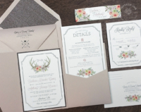 Floral Antler Pocket Invitation with blush pink flowers and antlers, in a nude shimmer pocket folder.