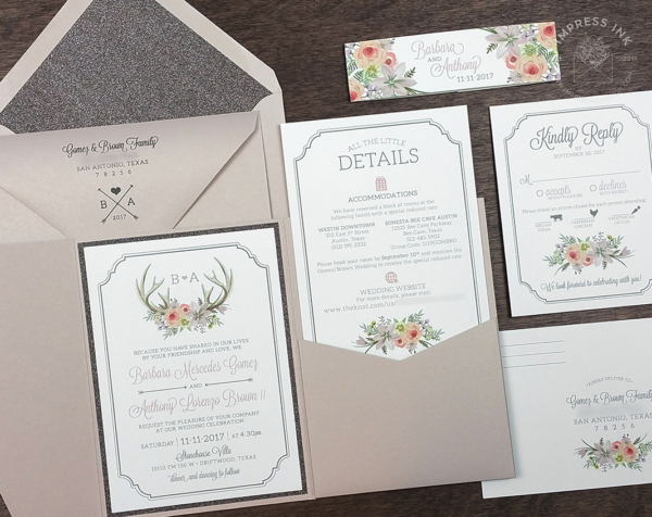 Floral Antler Pocket Invitation with blush pink flowers and antlers, in a nude shimmer pocket folder.