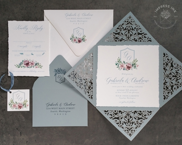Floral Crest Lace Invitation with monogram, mounted inside an ornate laser cut folder