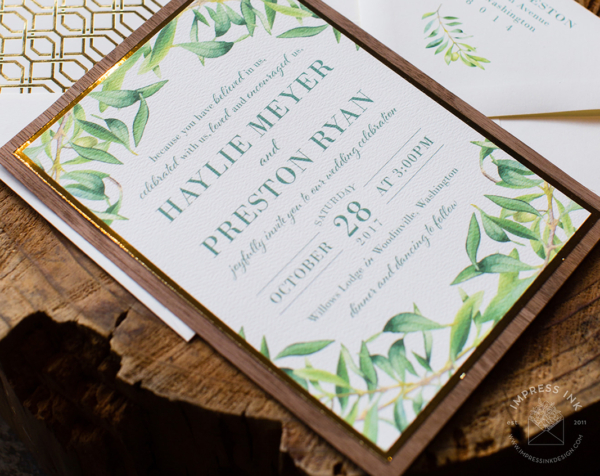 Olive Branch Greenery Invitation with gold and walnut wood backing layers, matching reply cards and printed envelopes