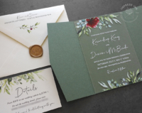 Greenery Clear Acrylic Invitation with a single bold red flower, seedling green folder.