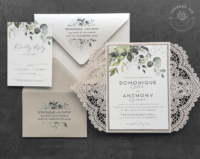 Laser Cut Greenery Invitation with eucalyptus in a laser cut lace gate folder
