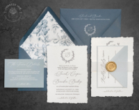 Slate Wreath Monogram Invitation with navy letterpress imprint, hand-torn edges, wax seals and slate blue envelopes