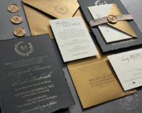 Black Wreath Monogram Invitation with gold foil imprint and hand-torn edges, antique gold envelopes and wax seals