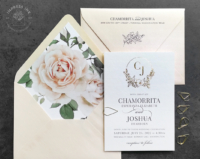 Floral Wreath Monogram Invitation in gold foil with charcoal gray text, soft coral envelope with large nude rose liners