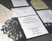 Ornate Laser Cut Invitation with black lace pocket folder and formal square invitation with gold foil