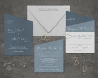 Blue Modern Angles Invitation set in shades of dusty and slate blue with gold teardrop paper clips