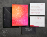 Bright Sunset Watercolor Invitation in shades of hot pink, bright red, and tangerine orange, with modern fonts and black envelopes