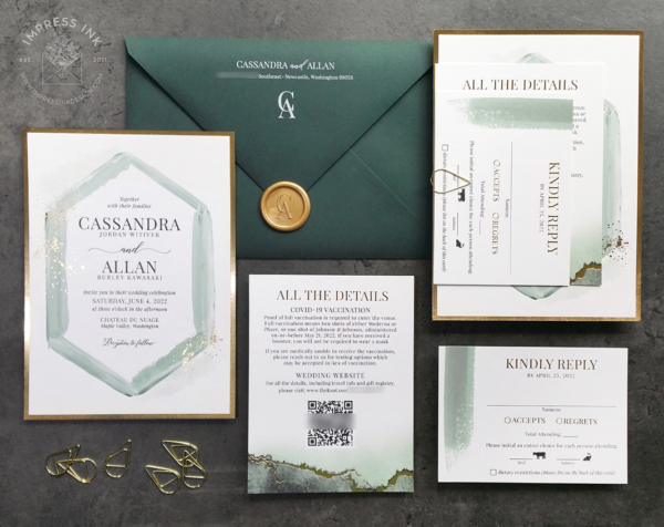 Green Geometric Watercolor Invitation with hexagon frame and splatters of gold foil, evergreen envelopes and gold wax seals