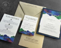 Jewel Toned Watercolor Invitation with gold foil accents and gold envelopes