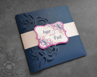 Laser Cut Filigree Invitation with navy and bright purple swirls and flourish