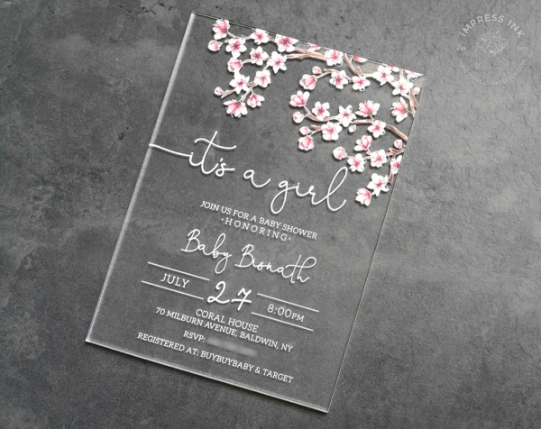 Acrylic Cherry Blossom Invitation for a baby shower with pink flowery branches on a clear card