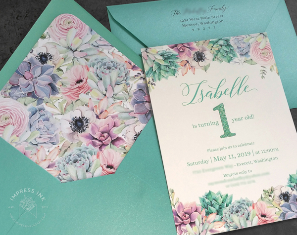 Succulents Baby Birthday Invitation with pastel florals and turquoise envelopes