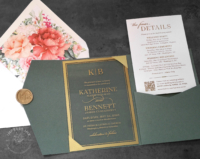 Gold Border Acrylic Invitation with Green pocket folder and bright coral and peach floral envelope liners