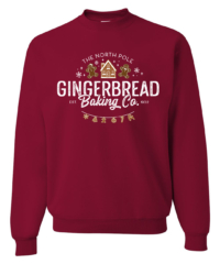 Unisex Gingerbread Crewneck Sweatshirt featuring a festive Christmas holiday graphic in rust and brown on a cozy cardinal red crewneck sweatshirt.