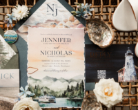 Pacific Northwest Wedding Invitations with watercolor artwork of mountains, water, and a ferry boat