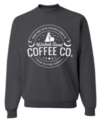 Unisex Wicked Coffee Crewneck Sweatshirt featuring a festive haunted Halloween holiday graphic in white on a cozy Charcoal Gray crewneck sweatshirt.